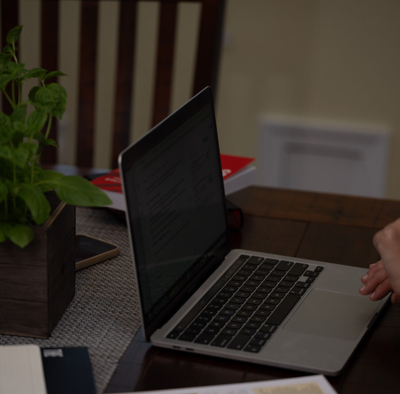 Laptop on a desk in an office showing subscription business KPIs for small business