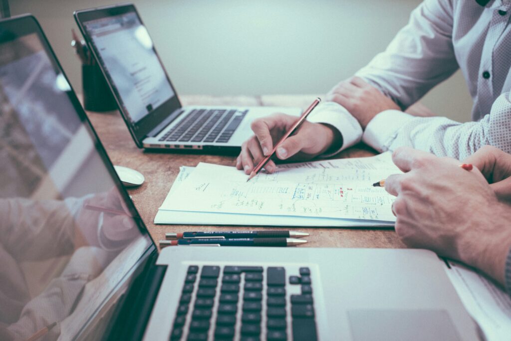 two colleagues in a one on one workflow coaching session for a subscription business